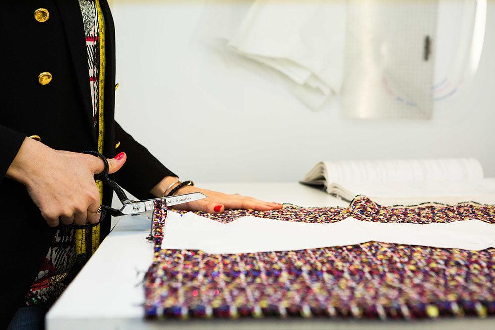 Precision fabric cutting for bespoke women's tailoring in the UK