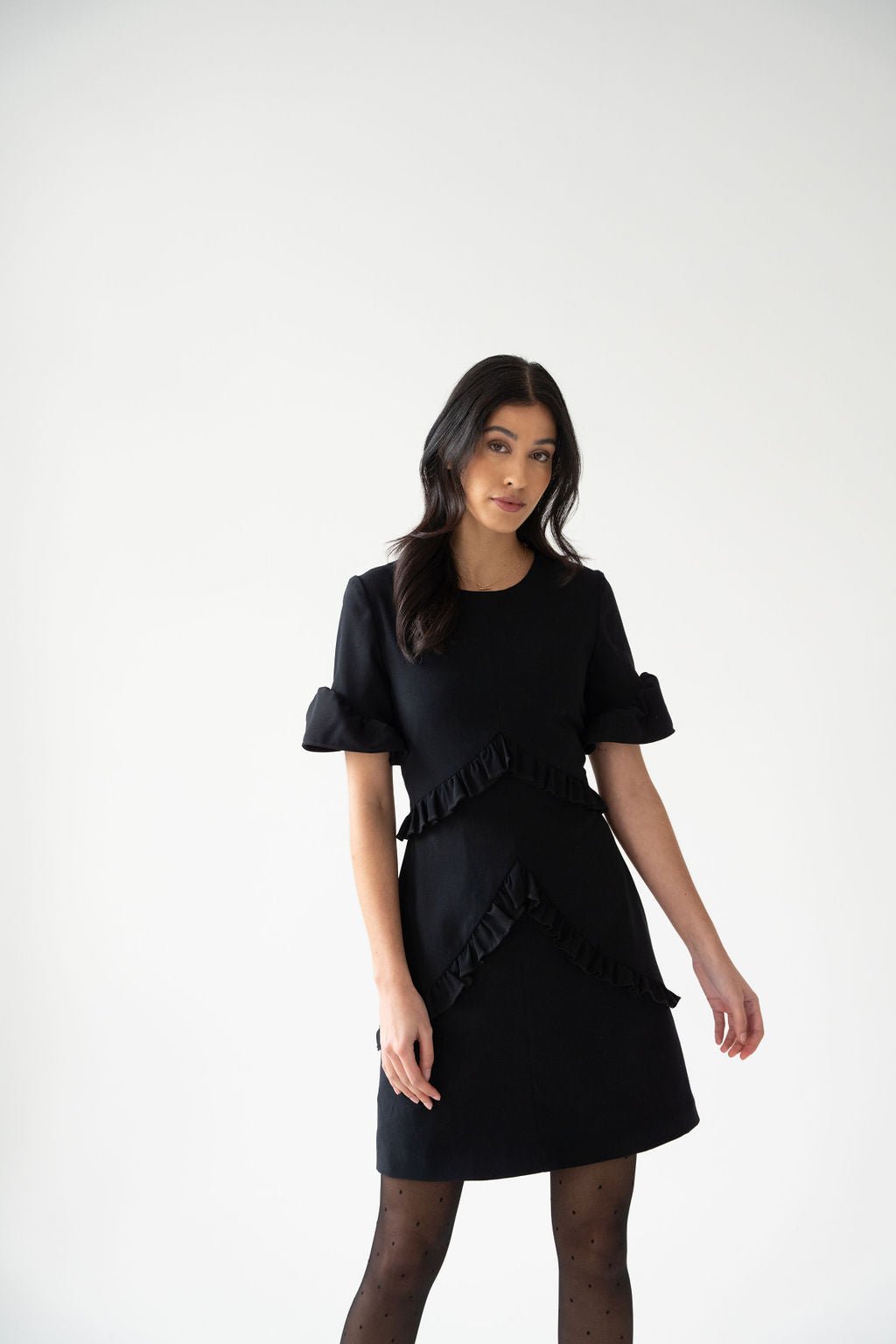 Black crepe ruched mini dress