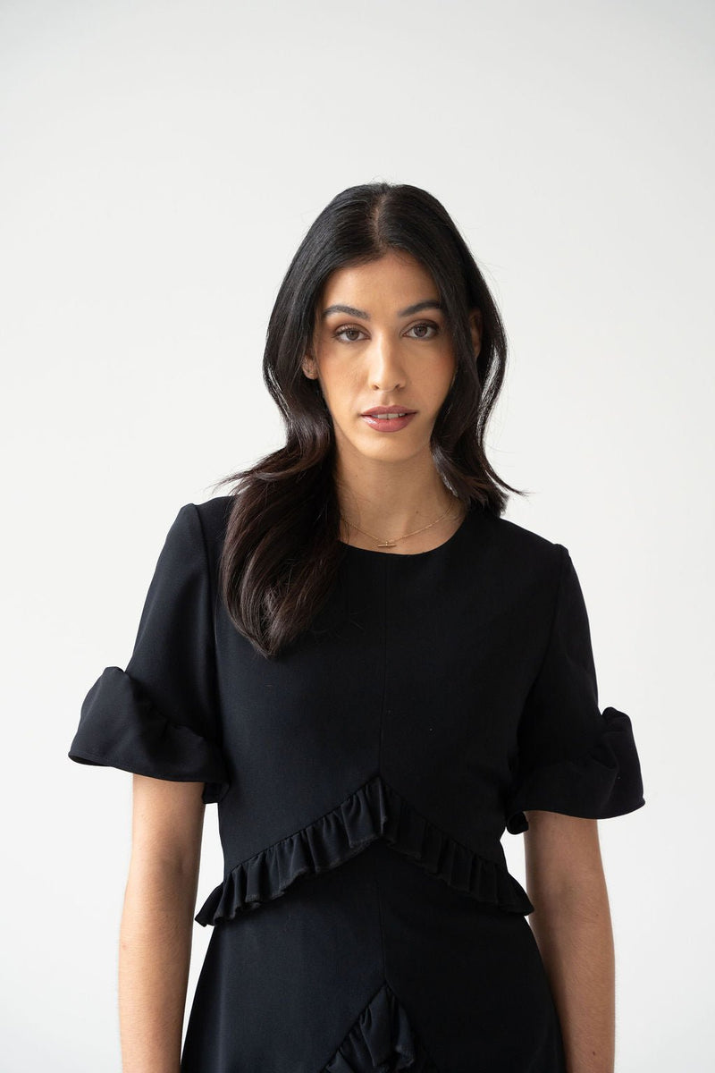 Black crepe ruched mini dress