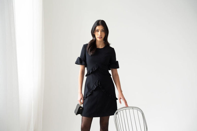 Black crepe ruched mini dress