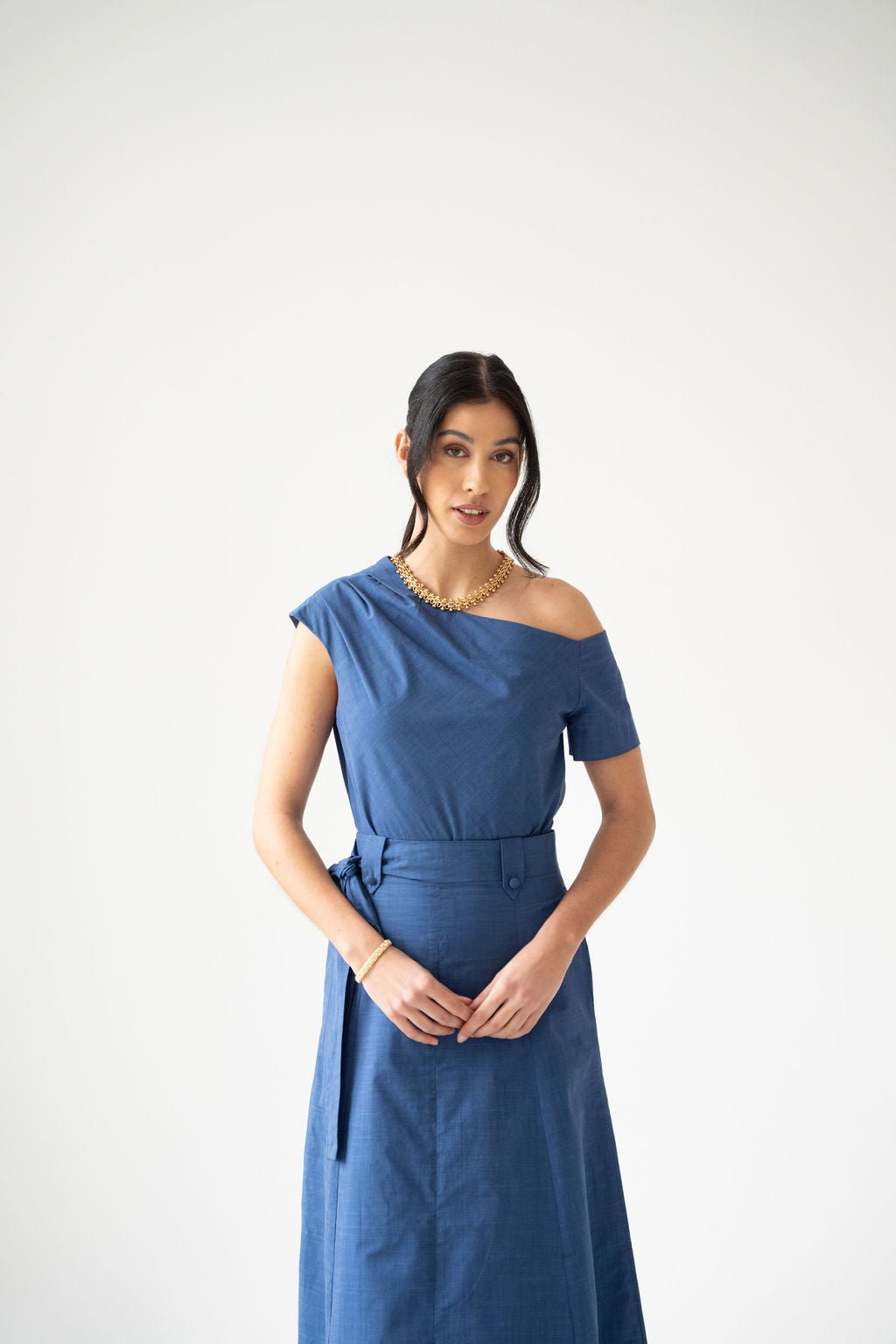 Blue cotton off the shoulder draped top