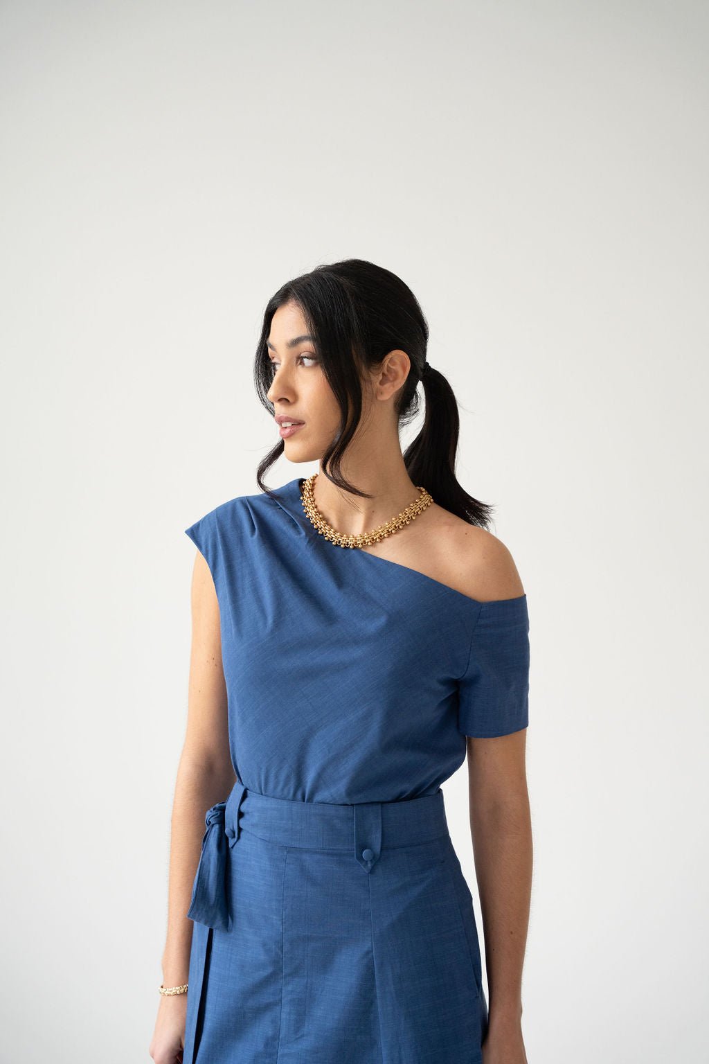 Blue cotton off the shoulder draped top