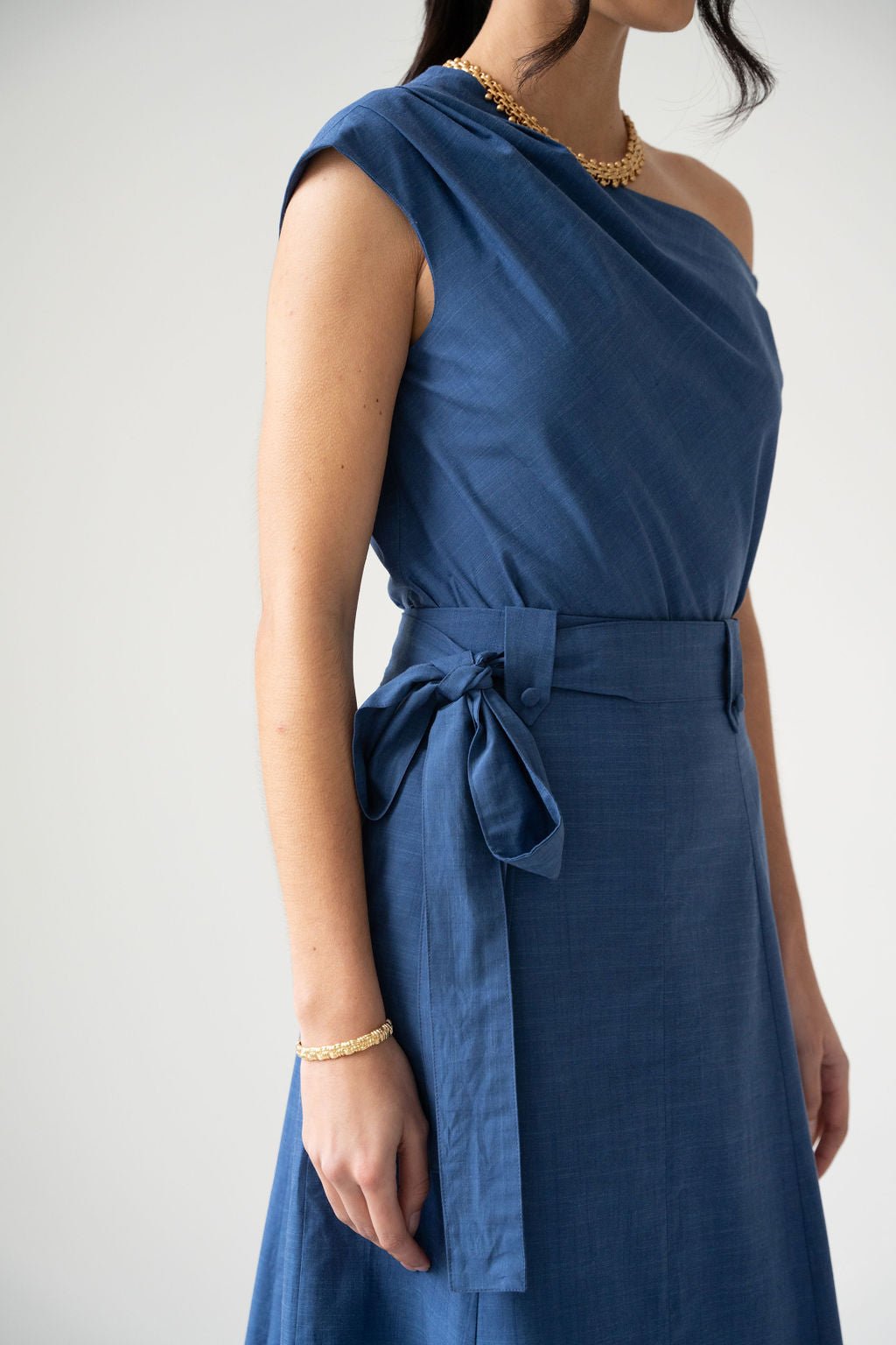 Blue cotton off the shoulder draped top